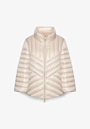 Giacca imbottita beige chiaro con colletto alto, motivi trapuntati orizzontali e a chevron, e chiusura centrale con cerniera dorata.