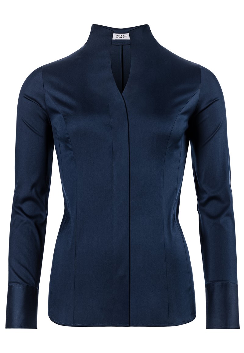 Navyblauw overhemd met lange mouwen en hoge kraag, met een voorkantopening en strakke lijnen. Gemaakt van een zachte stof met een gestructureerde pasvorm.