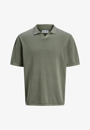 Olive green polo shirt made of soft fabric. Features a v-neck collar and short sleeves with a relaxed fit. Simple, unadorned design.