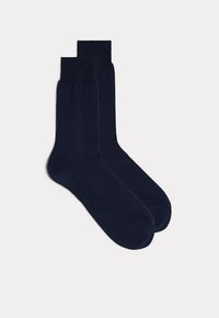 Marineblaue Baumwollsocken mit glatter Textur, gerippten Bündchen und einfachem, geradlinigem Design. Standardlänge, geeignet für den täglichen Gebrauch.