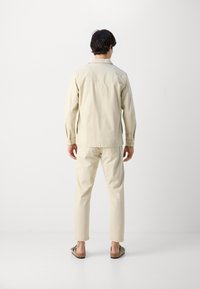 Lindbergh OVERSHIRT - Allvädersjacka - stone