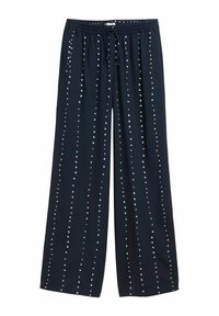Navy wide-leg pants in lightweight fabric, featuring a drawstring waist and white polka dot pattern arranged in vertical lines.