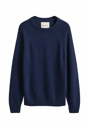 Marineblauwe gebreide trui met lange mouwen, geribbelde manchetten en zoom, een ronde hals en een klein merklavel binnenin de kraag.