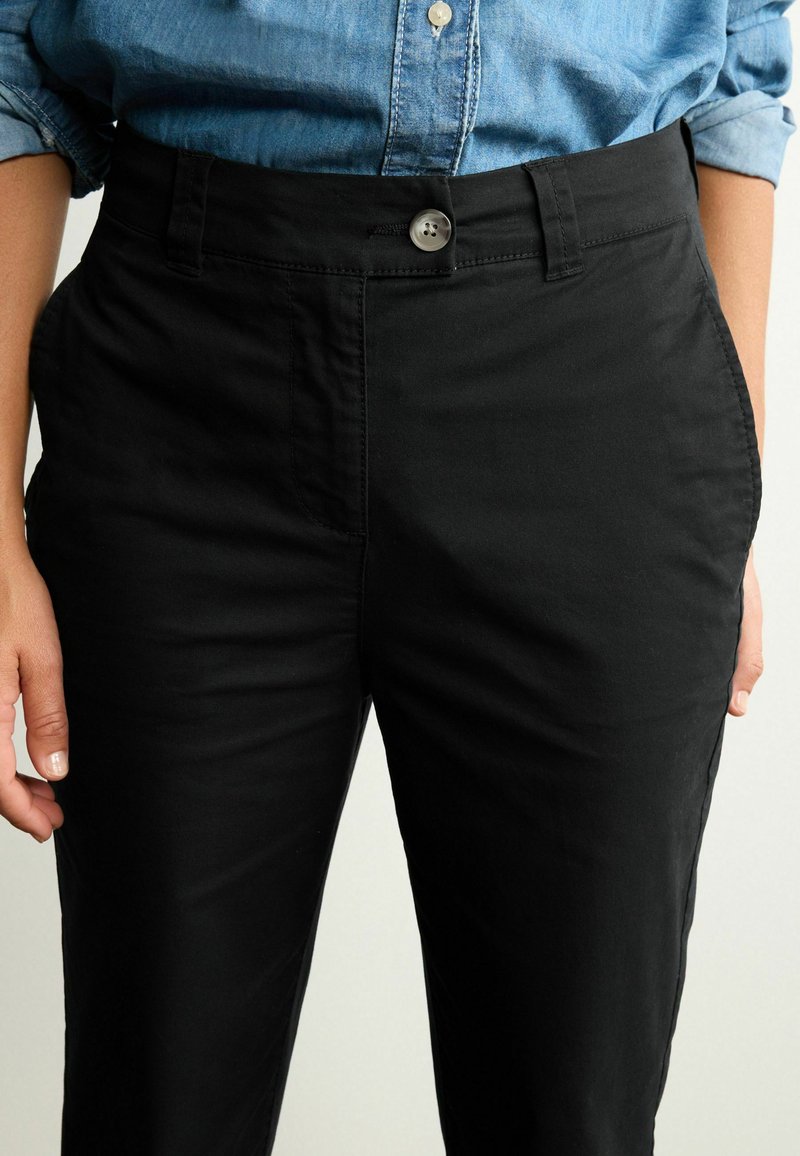 Next THE ULTIMATE PETITE Chinos black Zalando
