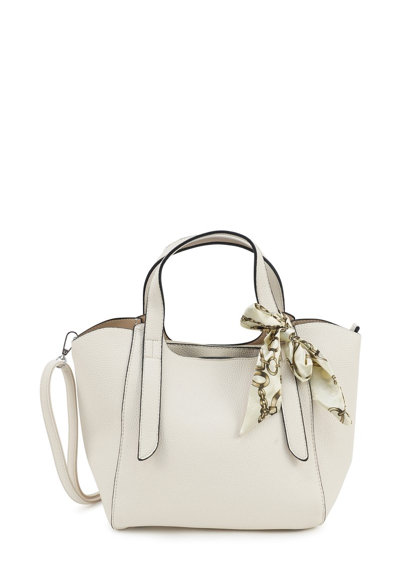 White leather handbag with textured finish, structured shape, black trim, dual handles, and a decorative silk scarf tied at the front.