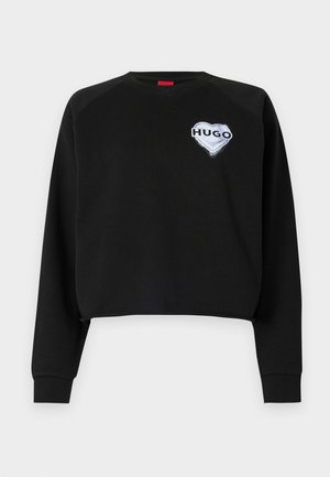 Black sweatshirt with a cropped design, featuring a crew neckline and long raglan sleeves. Embroidered heart logo with "HUGO" lettering on the chest.