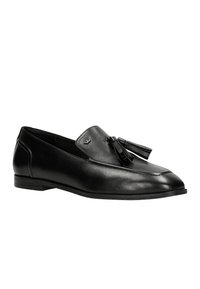 Schwarze Lederloafers mit glatter Textur, Quastenverzierung am Vorderblatt, niedrigem Absatz und spitzem Design.
