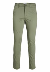 Pantalons vert olive en mélange de coton, coupe slim avec poches avant, fermeture à bouton et passants de ceinture. Texture lisse sans motifs.