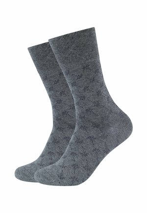 Calze grigie a fantasia con bordo a costine, di spessore medio e un design sottile sulla stoffa. Il materiale appare morbido e strutturato.