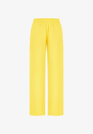 Pantalones amarillos de pierna ancha con cintura elástica, detalles de costuras delanteras y sin bolsillos visibles, mostrados sobre un fondo blanco liso.