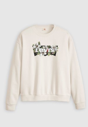 Kremfarget hettegenser laget av bomull, med blomstertrykk av Levi's-logoen, rund halslinning og ribbestrikkede mansjetter og nederkant.