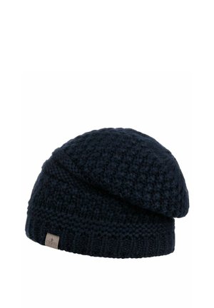 Dark navy blue knitted slouchy beanie hat with textured pattern and a small fabric brand label on the cuff.