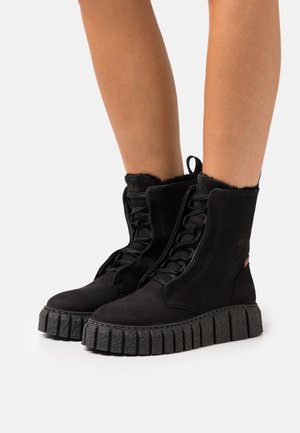Buffalo RAMPA LACE UP HI WARM - Platform ankle boots - black