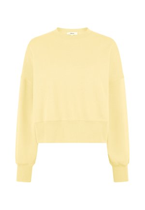 Pull léger jaune clair à col rond, manches longues, poignets et ourlet côtelés, coupe légèrement courte.