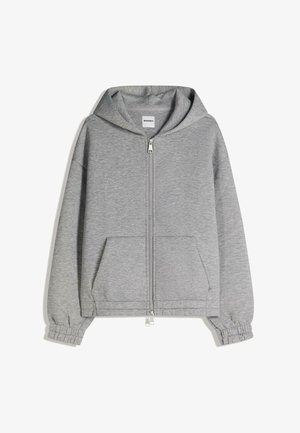 Sweat à capuche gris clair avec fermeture éclair, poches avant, poignets élastiques et capuche, étalé à plat montrant la vue de face.