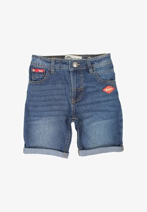 Shorts en denim bleu foncé, avec ourlets roulés, bouton avant avec fermeture éclair, et une petite étiquette rouge sur la poche gauche.