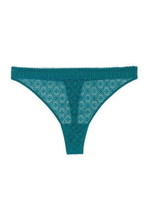 Slip di pizzo verde acqua con motivo floreale e vita in pizzo scallop su sfondo bianco.
