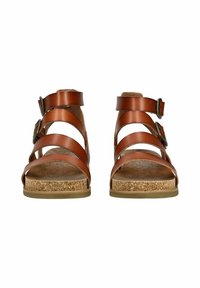 Brązowe skórzane sandały z wieloma paskami, klamrami i korkową podeszwą. Posiadają wyprofilowaną wkładkę i teksturowany wzór na wewnętrznej stronie.