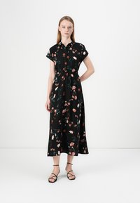 Robe noire à imprimé floral avec une taille ajustée, des manches courtes à capuchon et une longueur midi. Présente un col et un tissu fluide.