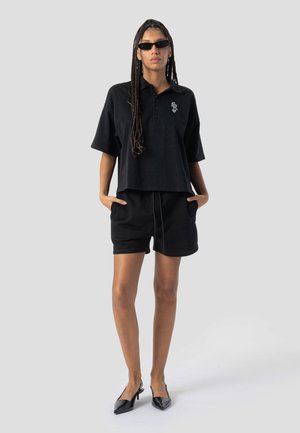 REMIA - Shorts - black