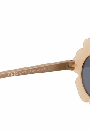 Lunettes de soleil en plastique marron avec des montures rondes en forme de fleurs et des verres teintés. Les branches présentent une finition lisse avec un texte en relief.