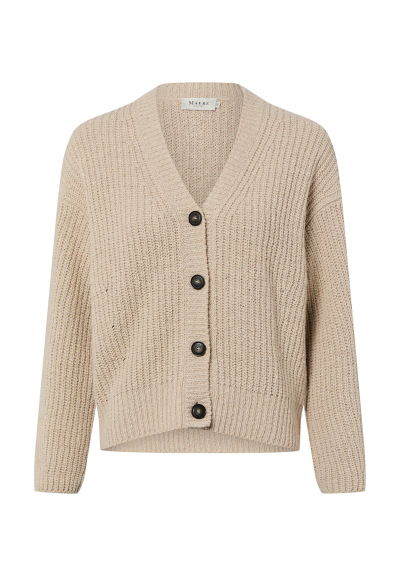 Beżowy sweter na drutach z dekoltem w serek, z pięcioma czarnymi guzikami z przodu i prążkowanym wzorem. Krótszy fason z długimi rękawami.