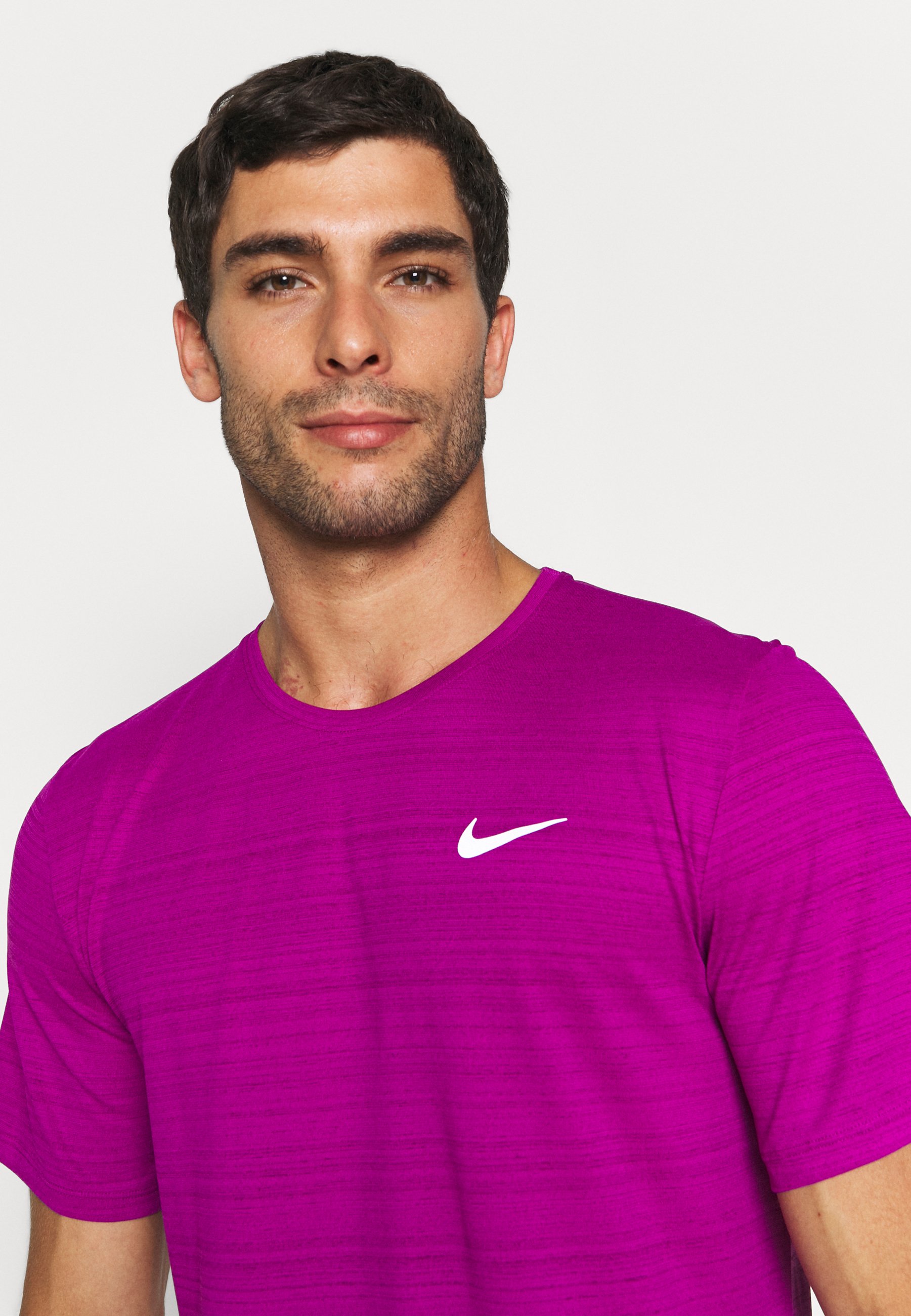 purple nike miler