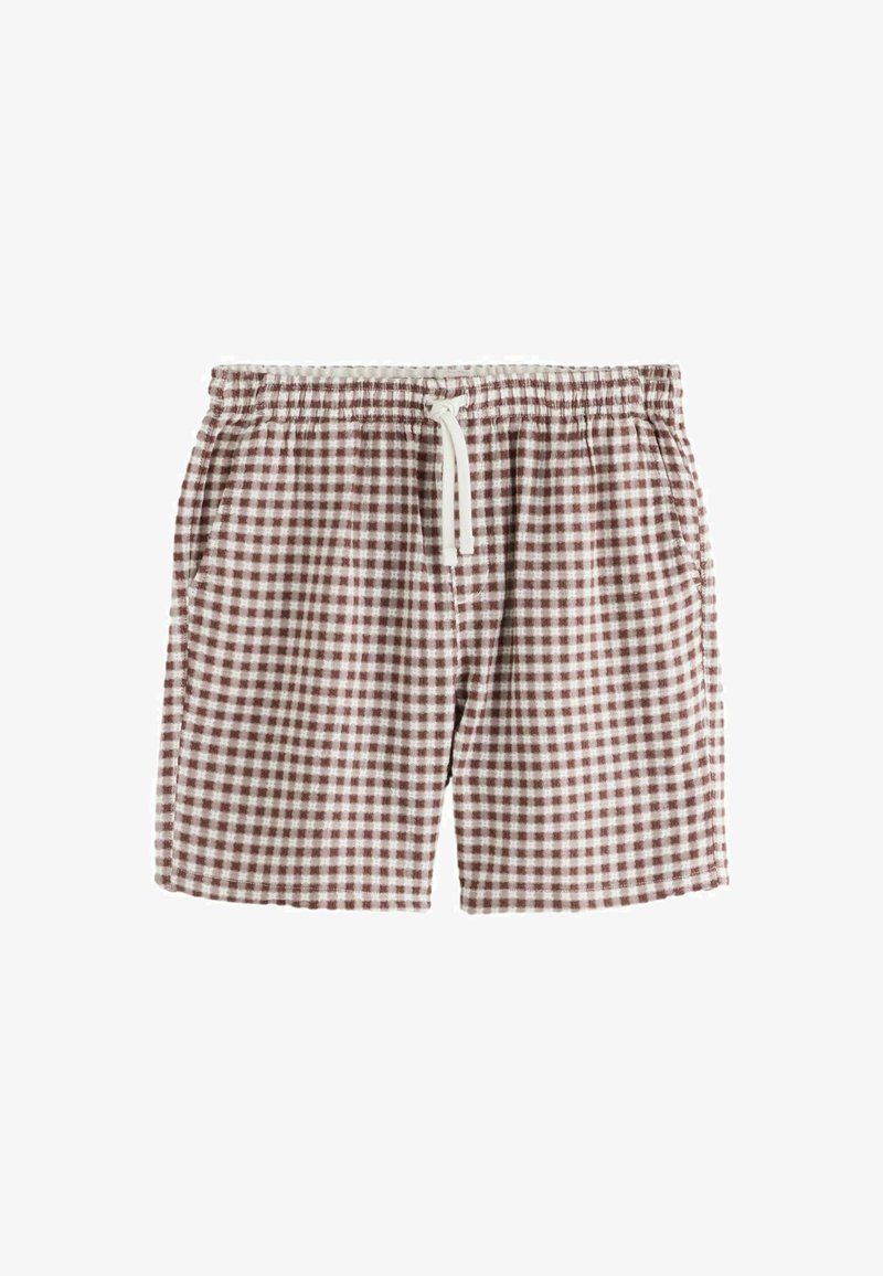 Short à carreaux marron et blanc avec taille élastique et cordon blanc, avec poches latérales.