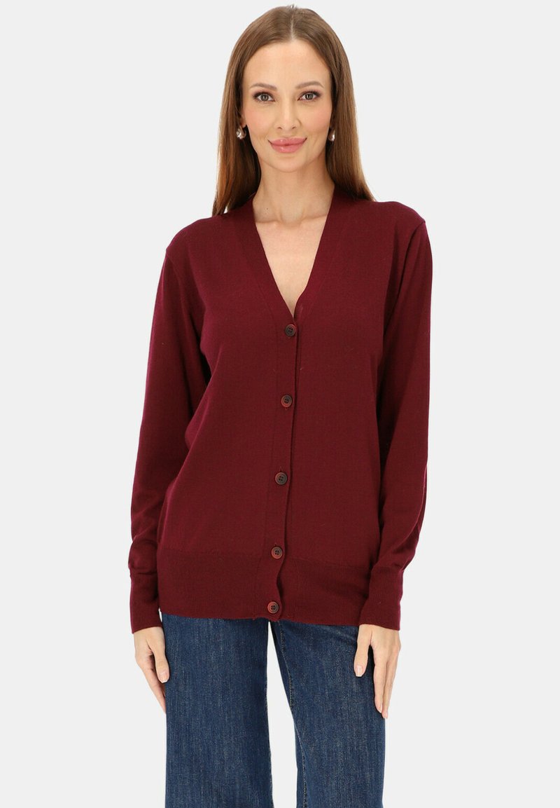 Bordowy sweter na guziki z dzianiny, z dekoltem w serek, długimi rękawami oraz zapinany z przodu. Posiada prążkowany dół i mankiety, gładką fakturę oraz klasyczny design.