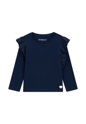 Donkerblauw shirt met lange mouwen voor peuters, met geplooide schouderdetails en klein metalen merkembleem in hartvorm nabij de zoom.