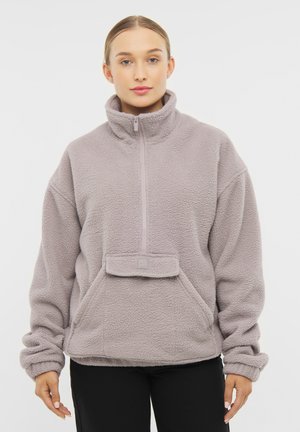 Fleece pullover in light gray, featuring a high collar and half-zip closure. Includes a front pocket and soft, textured fabric.