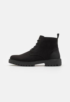 UNISEX - Lace-up ankle boots - black