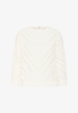 Valkoinen neulepaita, jossa on V-kaula-aukko ja chevron-kuvio avosilmukkadetaljeilla. Siinä on pitkät hihat sekä resorit hihoissa ja helmassa.