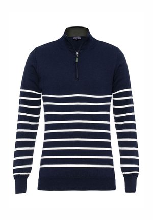 Marineblå striktrøje med hvide vandrette striber, halvlukket krave, ribbede manchetter og kant. Blød tekstur og klassisk design.