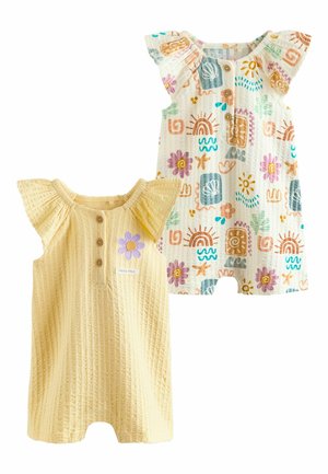 Dwa niemowlęce rampersy, jeden żółty z fioletowym kwiatem i guzikami, drugi biały z wielokolorowymi wzorami słońca, kwiatów i fal.