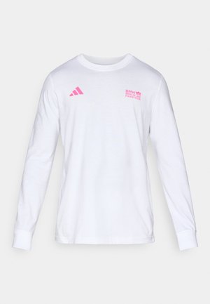 White long-sleeve crew neck shirt with pink Adidas logo and BMW Berlin Marathon text on the chest.