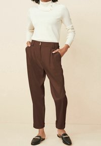 Next Sweter