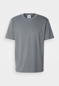 Gray cotton t-shirt with a round neckline, short sleeves, and a tonal logo on the chest. Smooth texture, standard fit with straight hem.