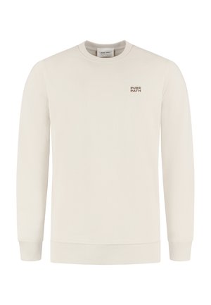 Hellbeige Sweatshirt mit Rundhalsausschnitt, langen Ärmeln, gerippten Bündchen und Saum. Auf der Vorderseite befindet sich ein kleines „PURE PATH“-Logo in Braun.