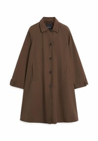 Brown long coat with button closure, two side pockets, a collar, and adjustable buttoned cuffs, laid flat on a white background.