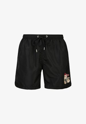 Zwarte zwembroek met een elastische tailleband en trekkoord, voorzien van een kleurrijke teddybeerafbeelding rechts onderaan vooraan.