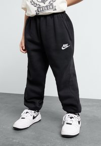 Nike Sportswear - CLUB LOOSE PANT - Teplákové kalhoty - black/white Miniatura obrázku 1