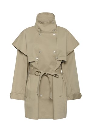 Beige waterproof jacket with a high collar, oversized flaps, and a drawstring belt. Features silver snap buttons and side pockets.