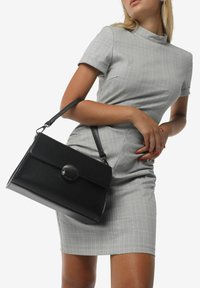 Miriade MYA - Borsa a mano - nero