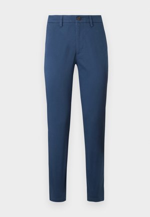 Chino blu in cotone con vestibilità slim, dotati di chiusura a bottoni, passanti per cintura e tasche standard, texture liscia e linee pulite.