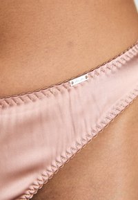 Lindex String - beige