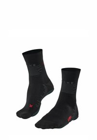 Calzini neri da crew con un tessuto a maglia testurizzato, caratterizzati da un marchio grigio e accenti rossi, progettati per comfort e durata.