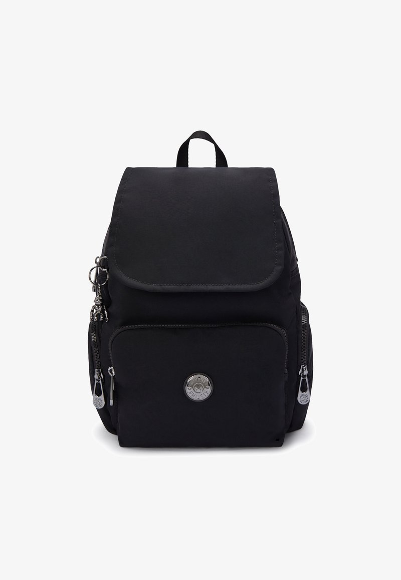 Black fabric backpack with a flap cover, multiple zippered pockets, silver hardware, and a round logo on the front. Smooth texture.