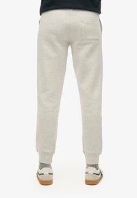 Superdry & Co ESSENTIAL LOGO JOGGERS - Trainingsbroek - gletschergrau meliert
