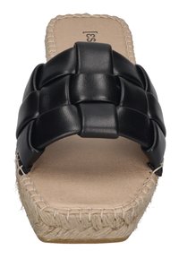 Black woven upper slide sandal with a natural woven jute platform. Smooth leather finish, flat sole, and beige inner lining.